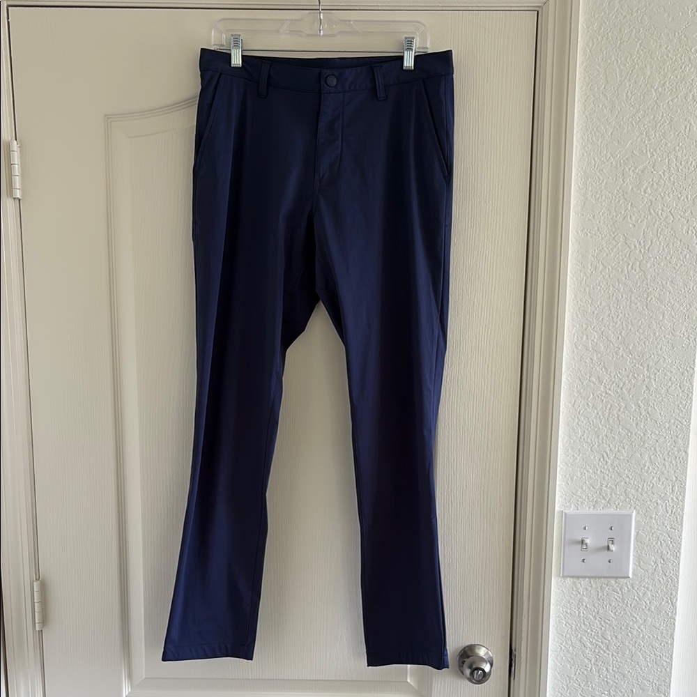 Men’s RHONE Navy Performance Pant commuter style